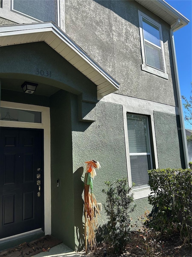 3031 San Jacinto Cir Unit 3031, Sanford, FL 32771 - property entrance featuring stucco siding