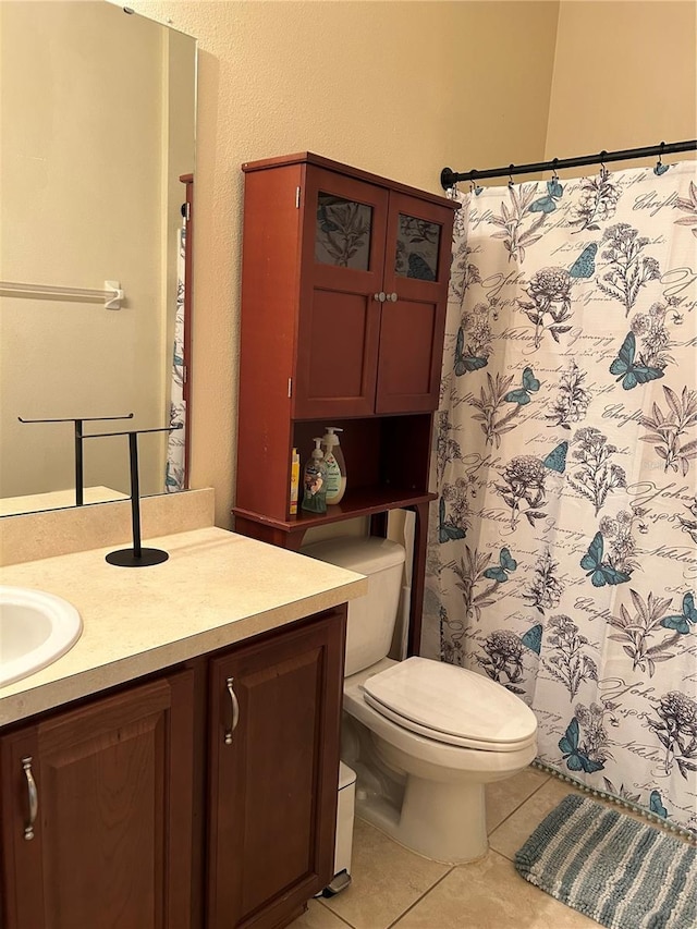 3031 San Jacinto Cir Unit 3031, Sanford, FL 32771 - bathroom with vanity, tile patterned flooring, toilet, and a shower with curtain