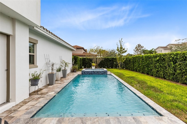 view of pool featuring a yard