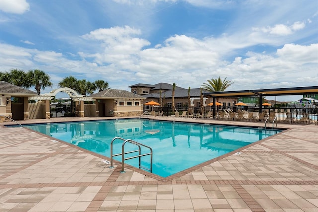 view of pool featuring a patio area