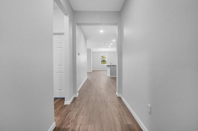 hall featuring light wood-type flooring