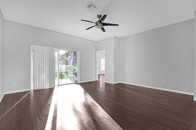 interior space with ceiling fan and dark hardwood / wood-style flooring