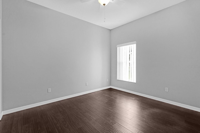 empty room with ceiling fan and wood-type flooring