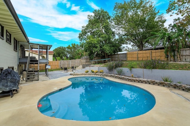 view of pool featuring a patio area