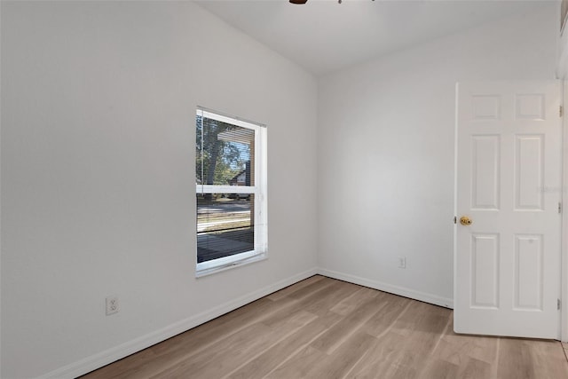 unfurnished room featuring ceiling fan and light wood-type flooring