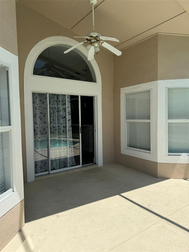 view of patio with ceiling fan