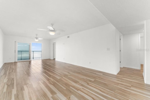 interior space featuring ceiling fan and light hardwood / wood-style floors