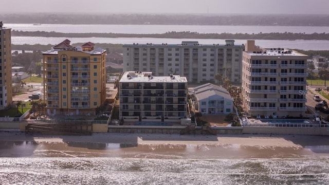 drone / aerial view with a water view