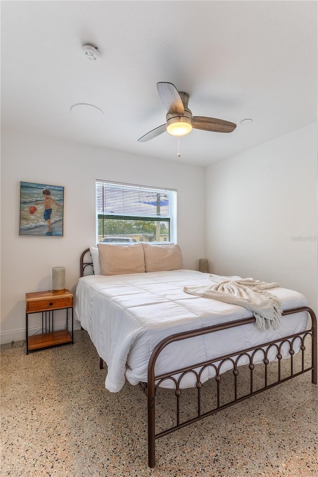 bedroom featuring ceiling fan