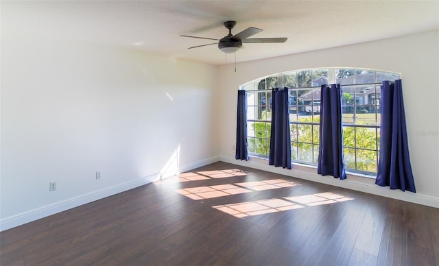 empty room featuring hardwood / wood-style flooring, ceiling fan, and a textured ceiling