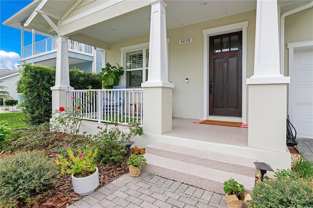 entrance to property with covered porch