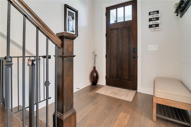 foyer entrance with hardwood / wood-style floors