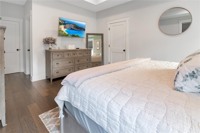 bedroom featuring dark hardwood / wood-style floors