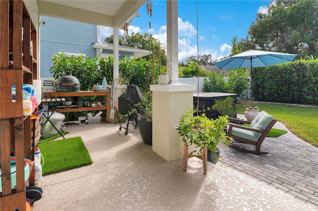 view of patio with a grill