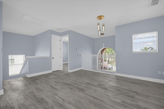 interior space featuring hardwood / wood-style flooring and a healthy amount of sunlight