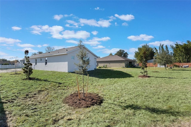 view of home's exterior featuring a yard