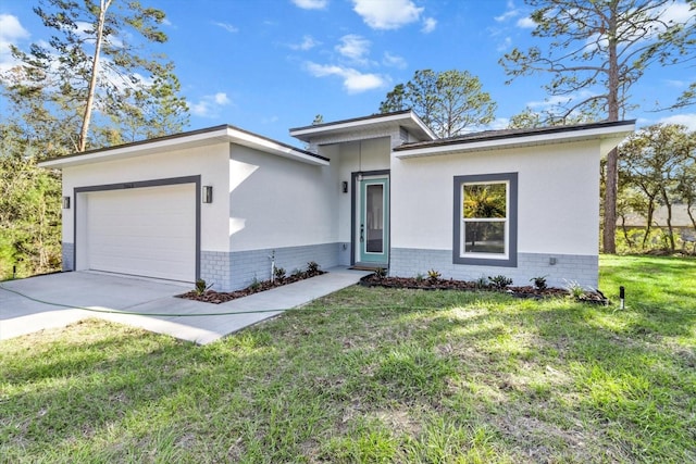 view of front facade featuring a garage and a front lawn