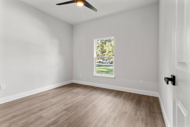 empty room featuring light hardwood / wood-style floors and ceiling fan