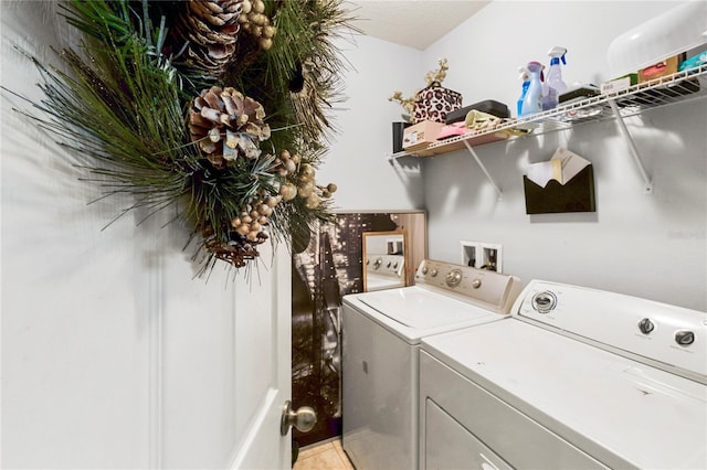 laundry room with separate washer and dryer