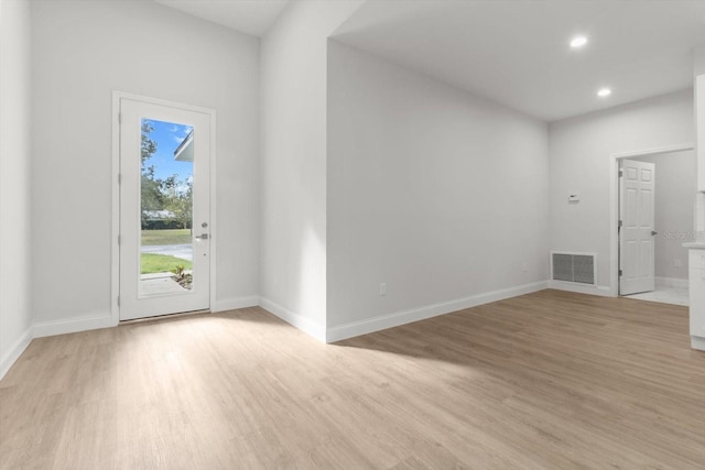 entrance foyer featuring light hardwood / wood-style floors