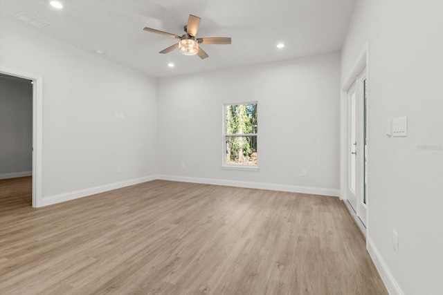 unfurnished room featuring ceiling fan and light hardwood / wood-style floors