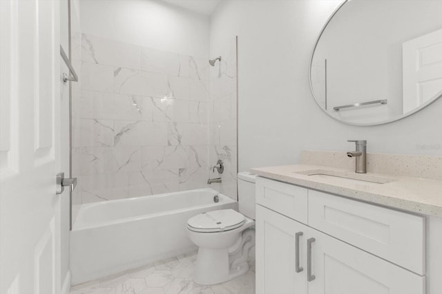 full bathroom with vanity, toilet, and tiled shower / bath