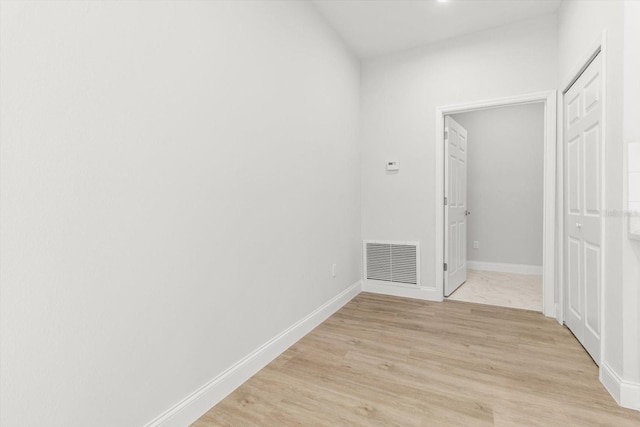 corridor featuring light hardwood / wood-style flooring