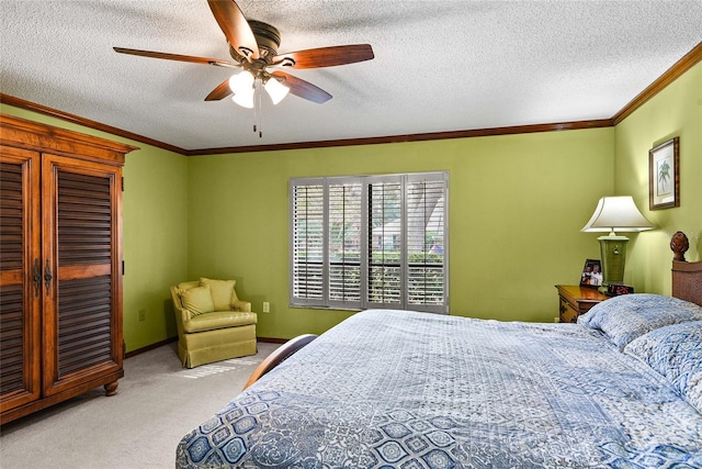 bedroom featuring a textured ceiling, light colored carpet, ceiling fan, and crown molding