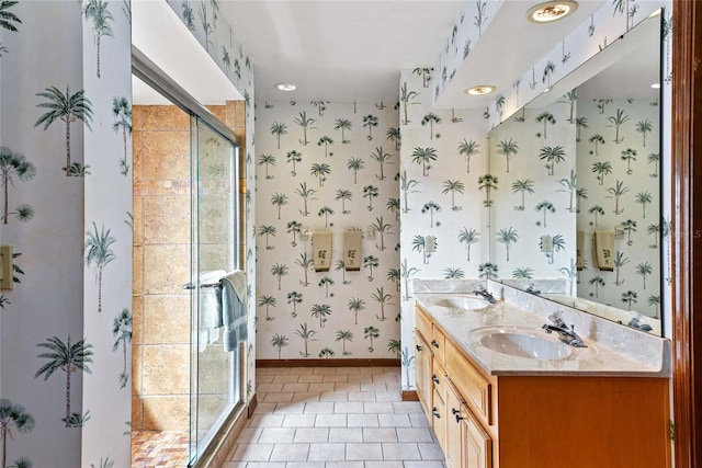 bathroom featuring vanity, tile patterned floors, and a shower with shower door