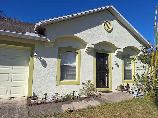 exterior space with a garage