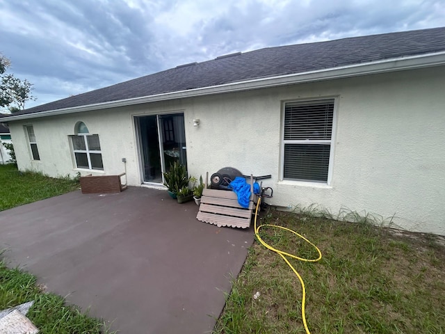 rear view of property with a patio