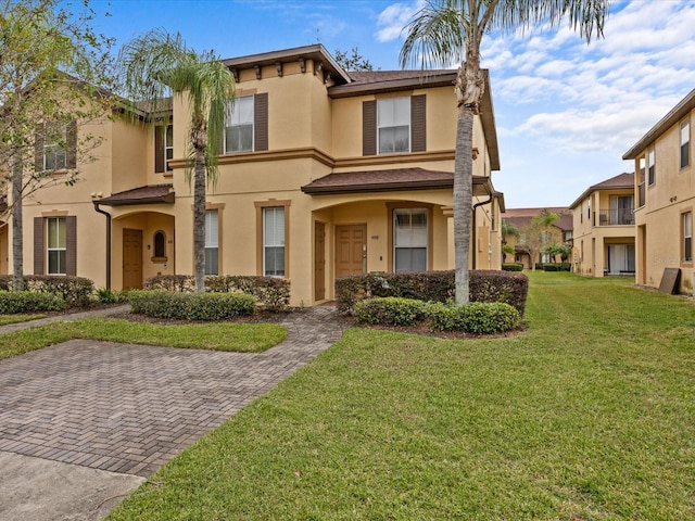 view of front of home with a front yard