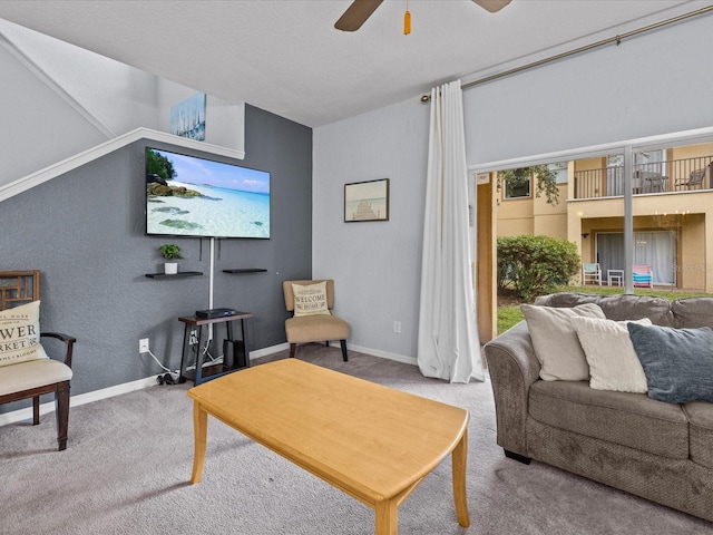 carpeted living room with ceiling fan