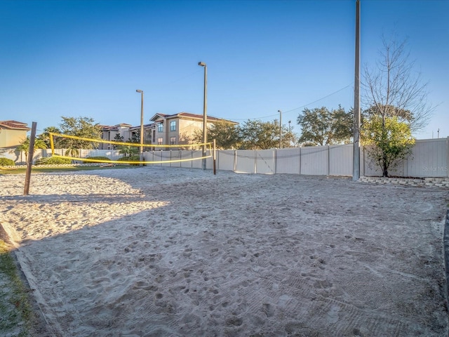 surrounding community featuring volleyball court