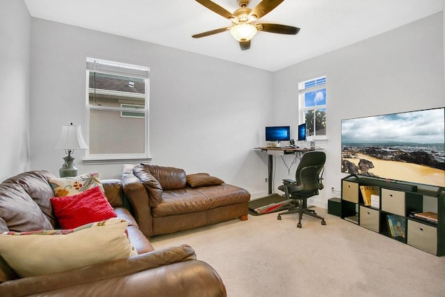 office space with carpet and ceiling fan