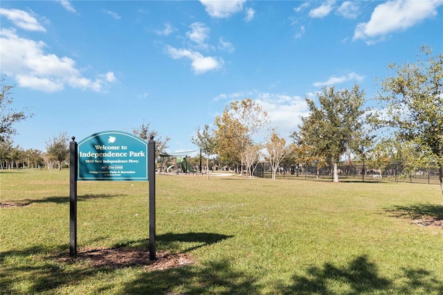 surrounding community featuring a lawn