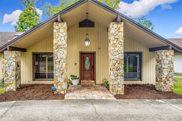 property entrance with covered porch