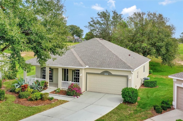 ranch-style house with a front yard, a porch, a garage, and cooling unit