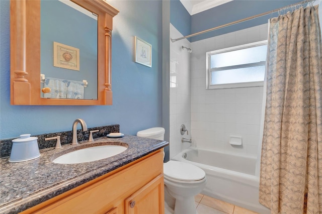 full bathroom with tile patterned flooring, shower / bath combination with curtain, vanity, and toilet