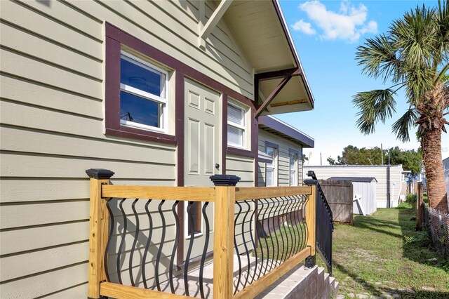 5305 S Ridgewood Ave, Port Orange, FL 32127 - wooden terrace featuring a yard