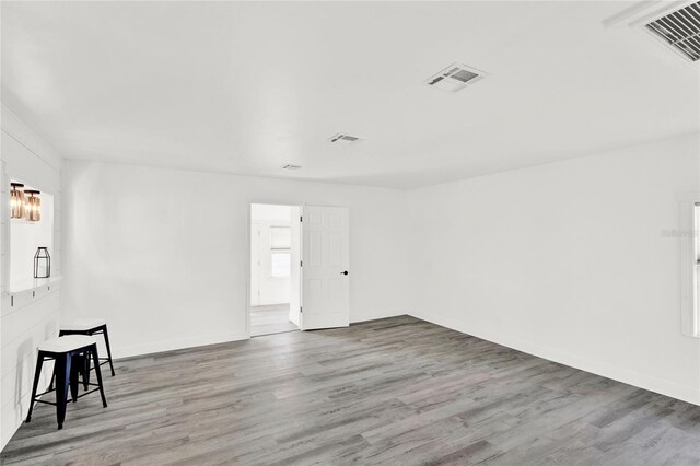 5305 S Ridgewood Ave, Port Orange, FL 32127 - empty room featuring wood finished floors and baseboards