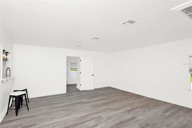 5305 S Ridgewood Ave, Port Orange, FL 32127 - empty room featuring wood finished floors and baseboards