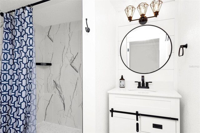 5305 S Ridgewood Ave, Port Orange, FL 32127 - full bathroom with a shower stall, vanity, and a chandelier