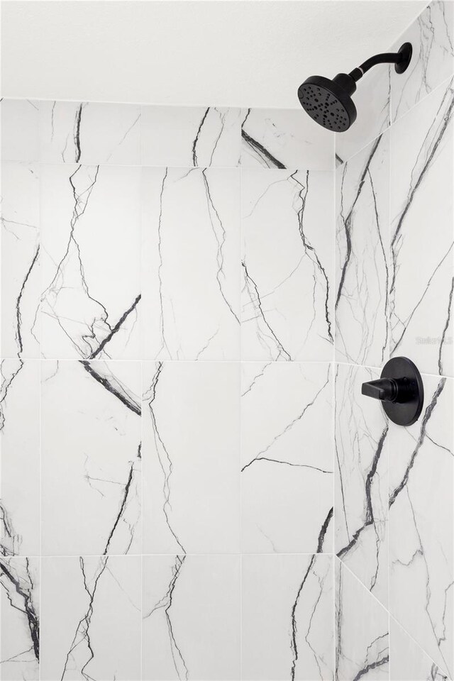 5305 S Ridgewood Ave, Port Orange, FL 32127 - bathroom view of a marble finish shower