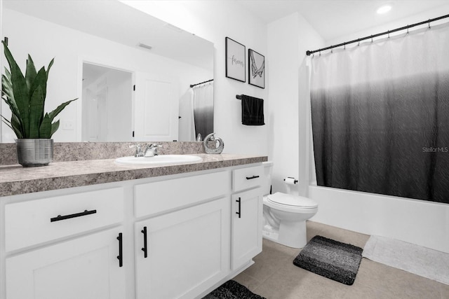 full bathroom featuring tile patterned floors, vanity, toilet, and shower / bathtub combination with curtain