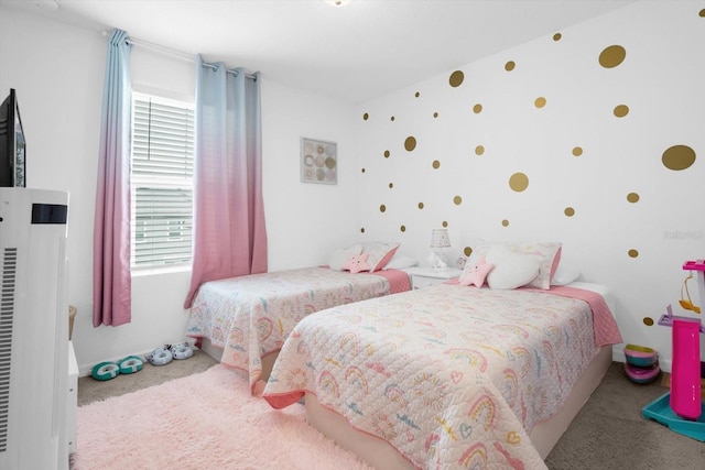 bedroom featuring carpet and multiple windows