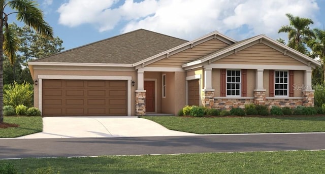 craftsman-style house featuring a front yard and a garage