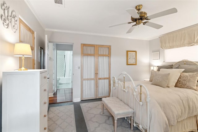 bedroom with ceiling fan and ornamental molding