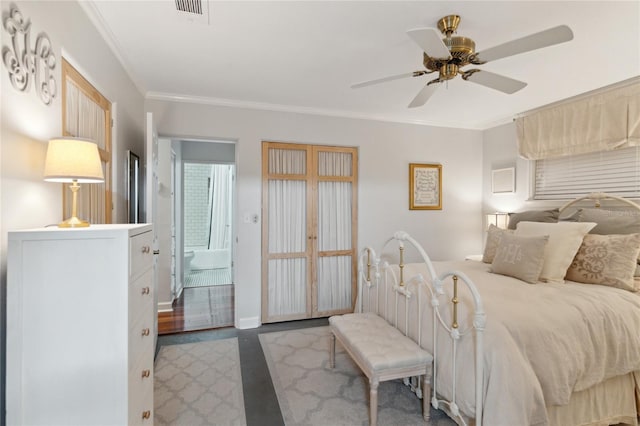 bedroom with ceiling fan and crown molding