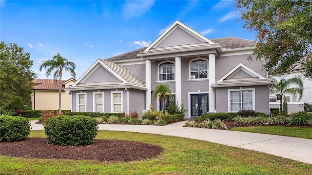 greek revival house with french doors